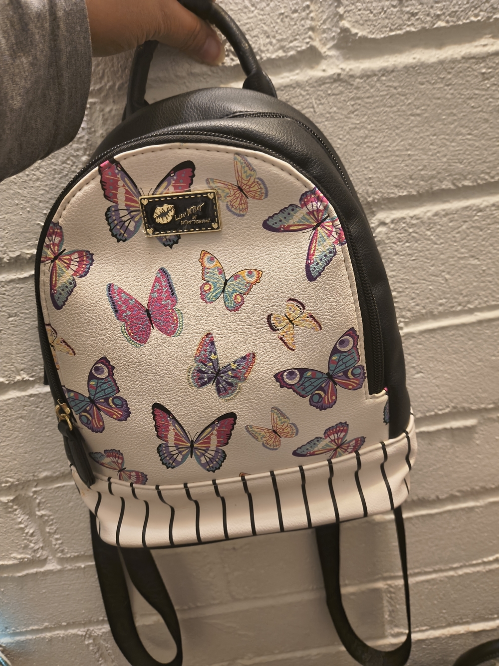 Betsey Johnson White Butterfly Mini Backpack with Black Trim